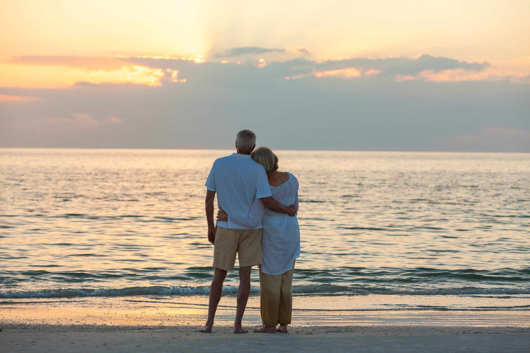 Senior Couple at Sunset Tropical Beach